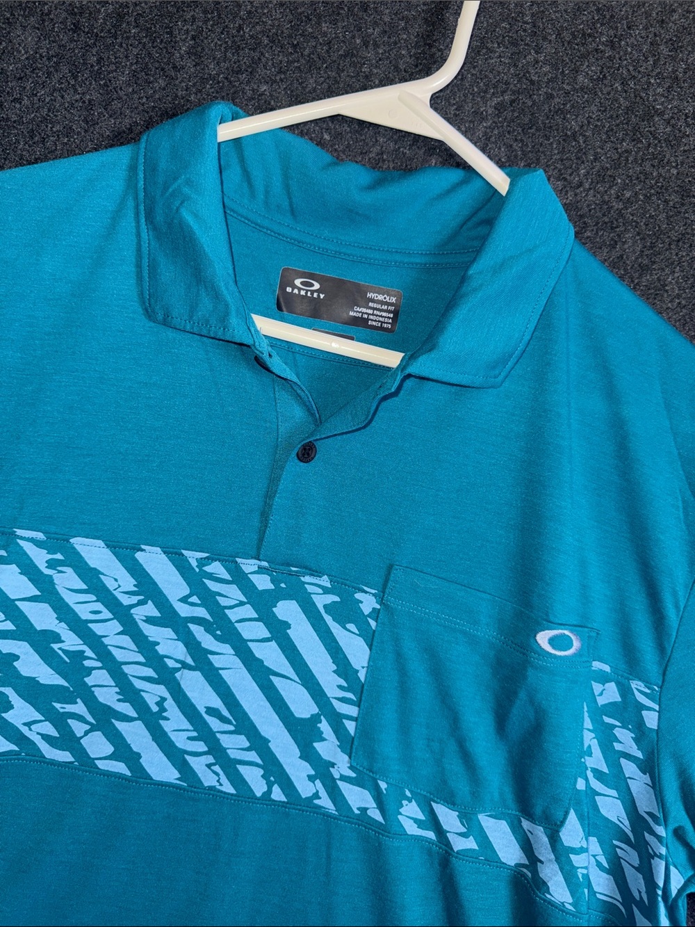 Oakley Men’s Teal Blue Polo with Graphic Chest Stripe